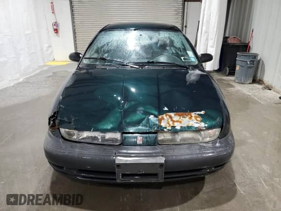 1998 Saturn SL с VIN 1G8ZH5280WZ312544, выставлен на аукционе Copart как лот 50971665 с пробегом 119 855 миль миль и Списание • Salvage title. История ставок и продаж доступна на DreamBid. Изображение 5.
