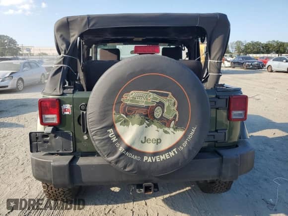 2007 Jeep Wrangler Sahara z VIN 1J8FA54107L153759, wystawiony jako Copart lot #61725475 z przebiegiem Nie podano mil oraz Szkoda całkowita • Salvage title. Historia ofert i sprzedaży dostępna na DreamBid. Obrazek 6.