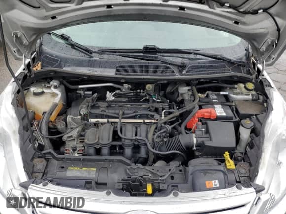 2012 Ford Fiesta S с VIN 3FADP4AJ5CM140340, выставлен на аукционе Copart как лот 69444035 с пробегом 81 571 миль миль и Чистый • Clean title. История ставок и продаж доступна на DreamBid. Изображение 11.