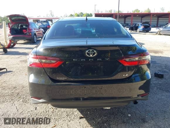 2021 Toyota Camry LE with VIN 4T1C11AK2MU472694, listed as a IAAI auction lot 43340745 with 61,965 mi miles and . Bid and sale history available at DreamBid. Image 16.
