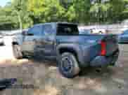 2025 Toyota Tacoma SR5 with VIN 3TMKB5FN4SM030413, listed as a Copart auction lot 69246415 with 2,871 mi miles and Salvage title. Bid and sale history available at DreamBid. Image 2.