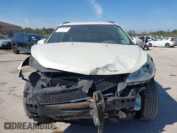 2011 Chevrolet Traverse 2LT z VIN 1GNKVJED6BJ199670, wystawiony jako IAAI lot #43329232 z przebiegiem 184 050 mil mil oraz . Historia ofert i sprzedaży dostępna na DreamBid. Obrazek 13.