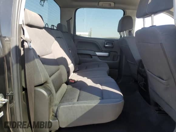 2018 Chevrolet Silverado 1500 LT z VIN 3GCUKREC3JG516403, wystawiony jako Copart lot #82135815 z przebiegiem 138 927 mil mil oraz Szkoda całkowita • Salvage title. Historia ofert i sprzedaży dostępna na DreamBid. Obrazek 10.