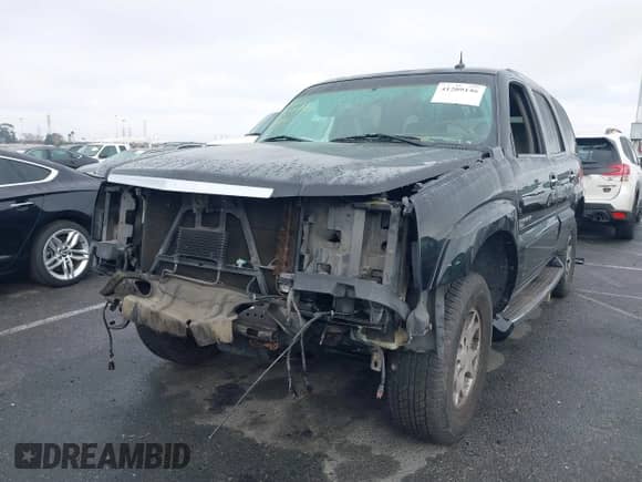 2003 Cadillac Escalade z VIN 1GYEK63NX3R280787, wystawiony jako IAAI lot #41209146 z przebiegiem Nie podano mil oraz . Historia ofert i sprzedaży dostępna na DreamBid. Obrazek 2.