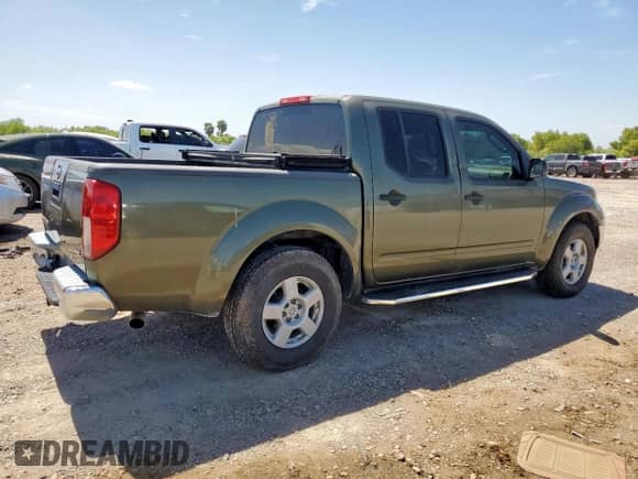 2005 Nissan Frontier SE with VIN 1N6AD07U15C402856, listed as a Copart auction lot 65883815 with 130,400 mi miles and Salvage title. Bid and sale history available at DreamBid. Image 3.
