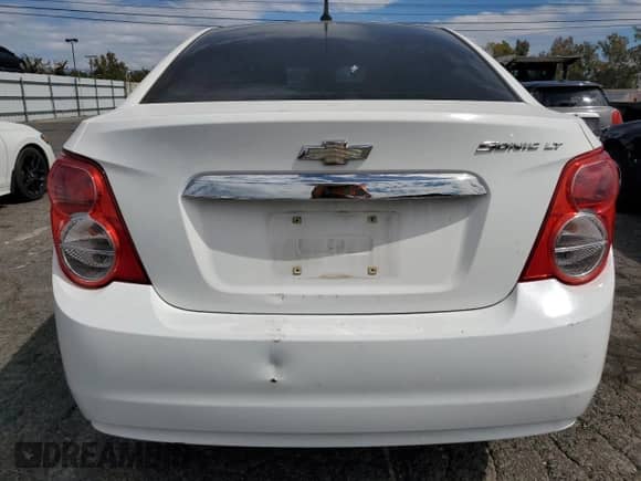 2012 Chevrolet Sonic LT z VIN 1G1JC5SHXC4133141, wystawiony jako Copart lot #81626425 z przebiegiem 82 138 mil mil oraz Szkoda całkowita • Salvage title. Historia ofert i sprzedaży dostępna na DreamBid. Obrazek 6.
