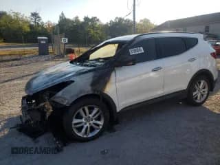 2013 Hyundai Santa Fe Sport с VIN 5XYZUDLA4DG001319, выставлен на аукционе Copart как лот 81505845 с пробегом Не указан миль и Списание • Salvage title. История ставок и продаж доступна на DreamBid. Изображение 1.