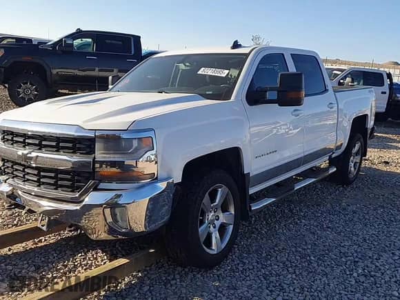 2016 Chevrolet Silverado 1500 LT with VIN 3GCUKREC4GG163842, listed as a Copart auction lot 82218595 with 100,157 mi miles and Salvage title. Bid and sale history available at DreamBid. Image 13.
