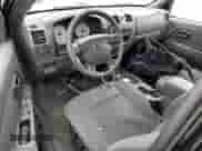 2006 Chevrolet Colorado Work Truck с VIN 1GCCS146768220256, выставлен на аукционе Copart как лот 54353355 с пробегом 143 239 миль миль и Списание • Salvage title. История ставок и продаж доступна на DreamBid. Изображение 8.
