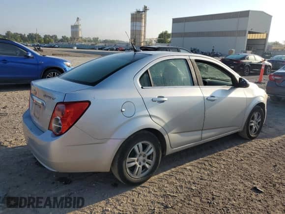 2014 Chevrolet Sonic LT with VIN 1G1JC5SH2E4203007, listed as a Copart auction lot 71227775 with 177,402 mi miles and Salvage title. Bid and sale history available at DreamBid. Image 3.
