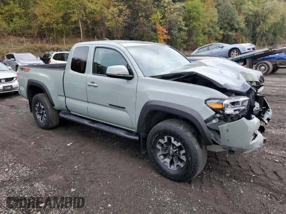 2022 Toyota Tacoma SR z VIN 3TYSZ5AN6NT076787, wystawiony jako Copart lot #86312735 z przebiegiem 22 446 mil mil oraz Szkoda całkowita • Salvage title. Historia ofert i sprzedaży dostępna na DreamBid. Obrazek 4.