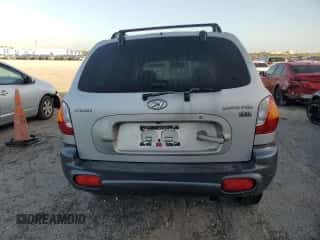 2004 Hyundai Santa Fe GLS с VIN KM8SC13EX4U633614, выставлен на аукционе Copart как лот 78379484 с пробегом Не указан миль и Списание • Salvage title. История ставок и продаж доступна на DreamBid. Изображение 6.