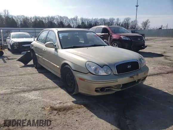 2002 Hyundai Sonata z VIN KMHWF25S42A656824, wystawiony jako Copart lot #46411645 z przebiegiem 194 814 mil mil oraz Szkoda całkowita • Salvage title. Historia ofert i sprzedaży dostępna na DreamBid. Obrazek 10.