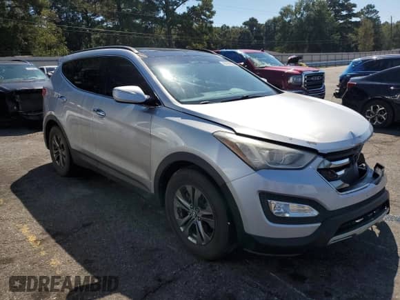 2014 Hyundai Santa Fe with VIN 5XYZU3LBXEG205112, listed as a Copart auction lot 84441695 with 210,968 mi miles and Salvage title. Bid and sale history available at DreamBid. Image 4.