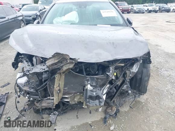 2020 Toyota Camry SE with VIN 4T1G11AK1LU874545, listed as a IAAI auction lot 42949156 with 90,328 mi miles and . Bid and sale history available at DreamBid. Image 6.