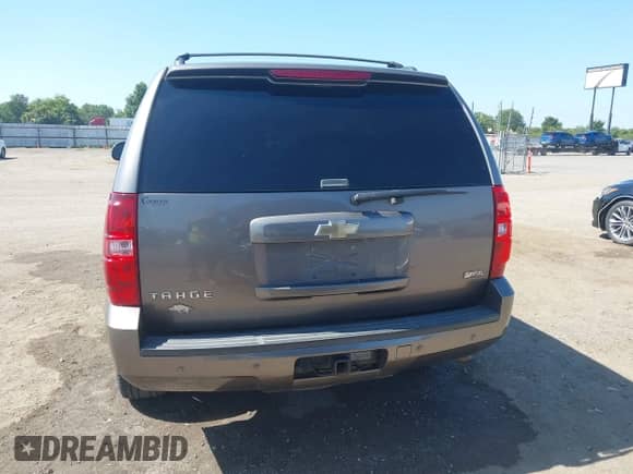 2011 Chevrolet Tahoe LT with VIN 1GNSCBE00BR397882, listed as a IAAI auction lot 42818583 with 191,303 mi miles and . Bid and sale history available at DreamBid. Image 16.