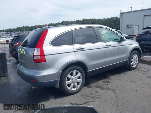 2007 Honda CR-V EX-L with VIN 5J6RE48727L015829, listed as a IAAI auction lot 43087900 with 157,734 mi miles and . Bid and sale history available at DreamBid. Image 4.