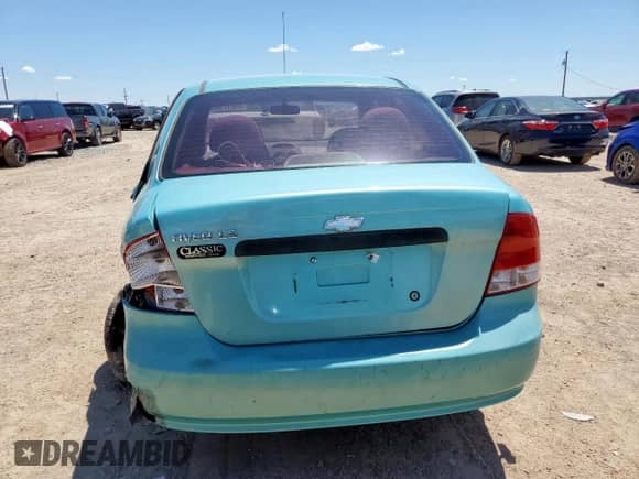 2005 Chevrolet Aveo LS z VIN KL1TD526X5B384453, wystawiony jako Copart lot #63617365 z przebiegiem 102 437 mil mil oraz Szkoda całkowita • Salvage title. Historia ofert i sprzedaży dostępna na DreamBid. Obrazek 6.