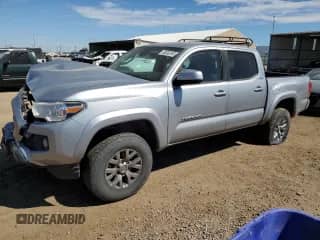 2019 Toyota Tacoma SR with VIN 3TMCZ5AN4KM197894, listed as a Copart auction lot 80353295 with 82,713 mi miles and Salvage title. Bid and sale history available at DreamBid. Image 1.