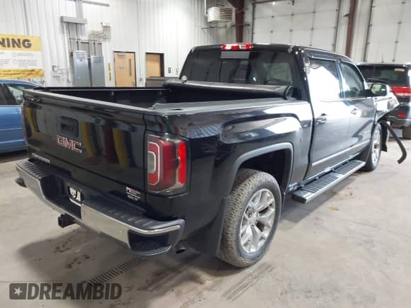 2017 GMC Sierra 1500 SLT with VIN 3GTU2NEC4HG164404, listed as a IAAI auction lot 43001474 with 103,649 mi miles and . Bid and sale history available at DreamBid. Image 4.
