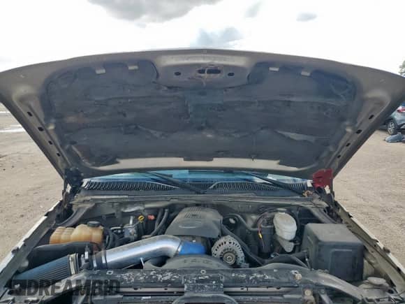 2003 Chevrolet Silverado 1500 LS z VIN 1GCEC14X83Z119411, wystawiony jako Copart lot #81822015 z przebiegiem 146 594 mil mil oraz Szkoda całkowita • Salvage title. Historia ofert i sprzedaży dostępna na DreamBid. Obrazek 11.