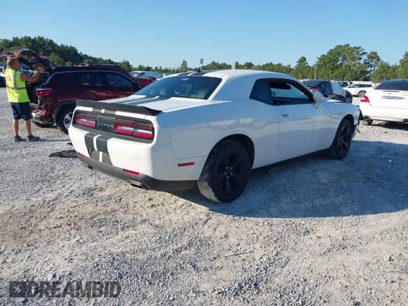 2023 Dodge Challenger SXT with VIN 2C3CDZAG1PH581701, listed as a IAAI auction lot 43126688 with 35,422 mi miles and . Bid and sale history available at DreamBid. Image 4.