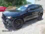 2017 Jeep Grand Cherokee Altitude with VIN 1C4RJFAGXHC864549, listed as a IAAI auction lot 42603675 with 151,648 mi miles and . Bid and sale history available at DreamBid. Image 2.