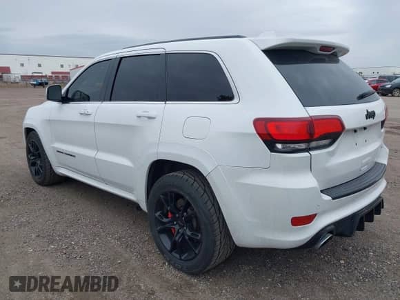 2015 Jeep Grand Cherokee SRT with VIN 1C4RJFDJ4FC882940, listed as a IAAI auction lot 43549108 with 18,901 mi miles and . Bid and sale history available at DreamBid. Image 3.