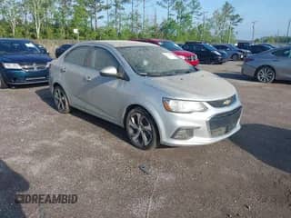 2018 Chevrolet Sonic Premier z VIN 1G1JF5SB6J4137350, wystawiony jako IAAI lot #41928048 z przebiegiem 90 206 mil mil oraz . Historia ofert i sprzedaży dostępna na DreamBid. Obrazek 1.