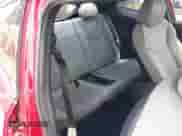 2013 Hyundai Veloster w/Black Int z VIN KMHTC6AD5DU086330, wystawiony jako IAAI lot #42805278 z przebiegiem 92 303 mil mil oraz . Historia ofert i sprzedaży dostępna na DreamBid. Obrazek 8.