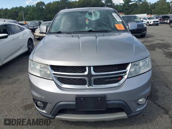 2017 Dodge Journey SXT with VIN 3C4PDCBG3HT536597, listed as a Copart auction lot 69964525 with 128,638 mi miles and Salvage title. Bid and sale history available at DreamBid. Image 5.
