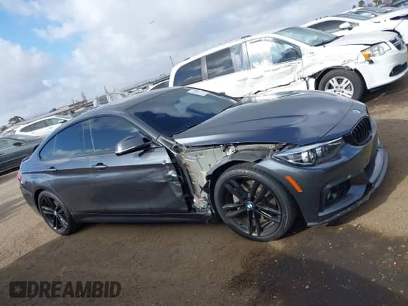 2018 BMW 4 Series 440i with VIN WBA4J5C55JBF07372, listed as a IAAI auction lot 41878383 with 68,043 mi miles and . Bid and sale history available at DreamBid. Image 14.