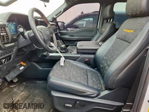 2023 Ford F-150 XL with VIN 1FTEW1E83PFB44870, listed as a Copart auction lot 67404595 with 69,006 mi miles and Salvage title. Bid and sale history available at DreamBid. Image 7.