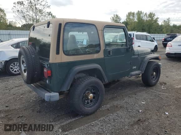 2000 Jeep Wrangler SE with VIN 1J4FA29P8YP735101, listed as a Copart auction lot 81805125 with Not provided miles and Clean title. Bid and sale history available at DreamBid. Image 3.