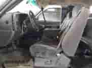 2002 GMC Sierra 1500 SLE with VIN 2GTEK19T721271003, listed as a Copart auction lot 64996825 with 230,604 mi miles and Salvage title. Bid and sale history available at DreamBid. Image 7.