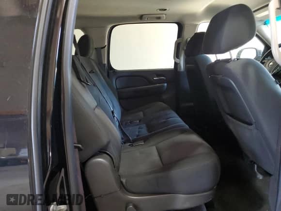 2013 Chevrolet Suburban LS with VIN 1GNSKHE76DR107148, listed as a Copart auction lot 79998334 with 238,411 mi miles and Salvage title. Bid and sale history available at DreamBid. Image 11.