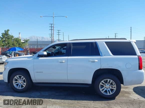 2020 Chevrolet Tahoe LT with VIN 1GNSCBKC0LR195687, listed as a IAAI auction lot 42620344 with 48,059 mi miles and . Bid and sale history available at DreamBid. Image 15.