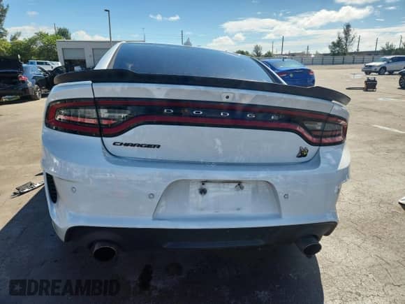 2023 Dodge Charger Scat Pack z VIN 2C3CDXGJ2PH646143, wystawiony jako Copart lot #85075215 z przebiegiem 31 823 mil mil oraz Nie do naprawy • Non repairable. Historia ofert i sprzedaży dostępna na DreamBid. Obrazek 6.