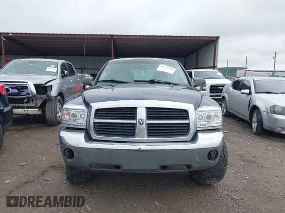 2005 Dodge Dakota SLT with VIN 1D7HE48NX5S165812, listed as a IAAI auction lot 42479950 with 147,645 mi miles and . Bid and sale history available at DreamBid. Image 13.