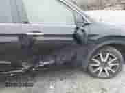 2022 Honda Pilot Touring 7-Passenger z VIN 5FNYF5H61NB013372, wystawiony jako IAAI lot #41595890 z przebiegiem 53 664 mil mil oraz . Historia ofert i sprzedaży dostępna na DreamBid. Obrazek 17.