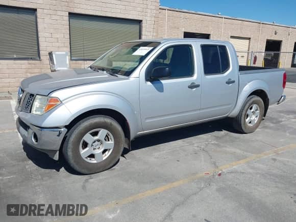 2006 Nissan Frontier LE with VIN 1N6AD07U56C472233, listed as a IAAI auction lot 43039519 with 123,029 mi miles and . Bid and sale history available at DreamBid. Image 2.