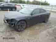 2016 Dodge Charger SXT с VIN 2C3CDXHG3GH265985, выставлен на аукционе Copart как лот 85663965 с пробегом 122 539 миль миль и Списание • Salvage title. История ставок и продаж доступна на DreamBid. Изображение 1.