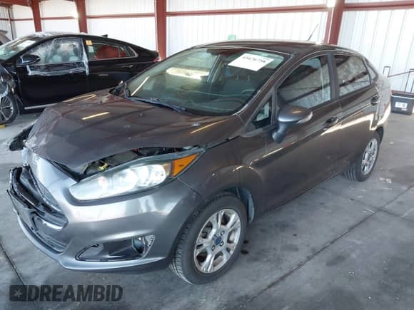 2015 Ford Fiesta SE with VIN 3FADP4BJXFM151076, listed as a IAAI auction lot 43476758 with 116,598 mi miles and . Bid and sale history available at DreamBid. Image 2.
