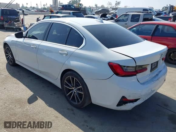 2019 BMW 3 Series 330i with VIN WBA5R1C55KAK06367, listed as a IAAI auction lot 43210794 with 125,760 mi miles and . Bid and sale history available at DreamBid. Image 3.