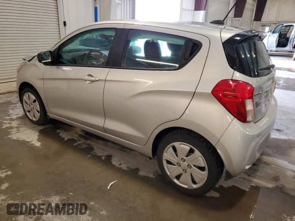 2018 Chevrolet Spark LS with VIN KL8CA6SA9JC471513, listed as a Copart auction lot 79328484 with 82,975 mi miles and Salvage title. Bid and sale history available at DreamBid. Image 2.