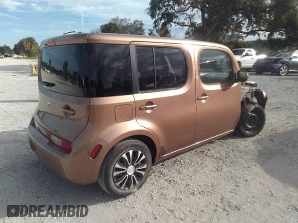 2011 Nissan Cube SL с VIN JN8AZ2KR7BT200249, выставлен на аукционе IAAI как лот 41673770 с пробегом 150 926 миль миль и . История ставок и продаж доступна на DreamBid. Изображение 4.