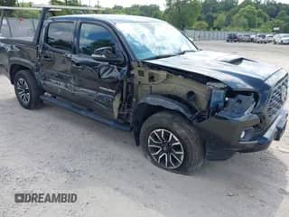 2020 Toyota Tacoma SR5 with VIN 3TMCZ5AN4LM350002, listed as a IAAI auction lot 42959937 with 82,282 mi miles and . Bid and sale history available at DreamBid. Image 1.