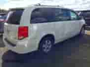 2013 Dodge Grand Caravan SXT with VIN 2C4RDGCG3DR575542, listed as a IAAI auction lot 43406310 with 143,737 mi miles and . Bid and sale history available at DreamBid. Image 4.