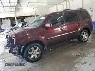 2010 Honda Pilot Touring with VIN 5FNYF4H8XAB018317, listed as a Copart auction lot 80478455 with 242,330 mi miles and Salvage title. Bid and sale history available at DreamBid. Image 1.