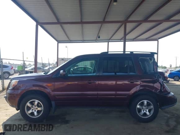 2007 Honda Pilot EX with VIN 5FNYF28497B028380, listed as a IAAI auction lot 43090693 with 232,405 mi miles and . Bid and sale history available at DreamBid. Image 13.